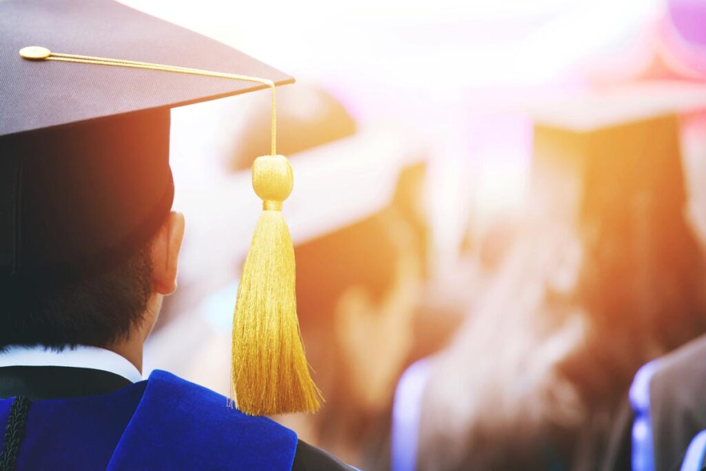 student wearing graduation cap