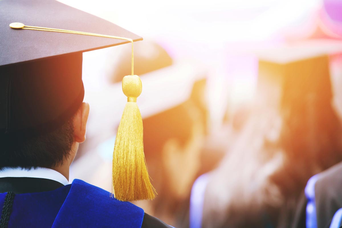 student wearing graduation cap