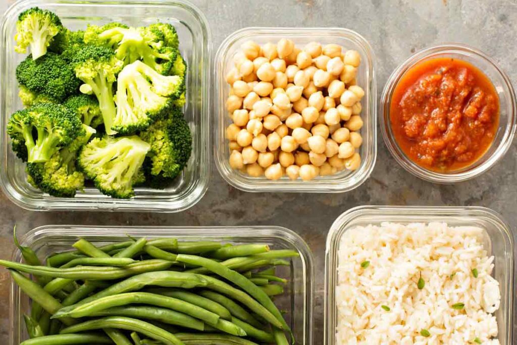 Various plastic containers with food in them