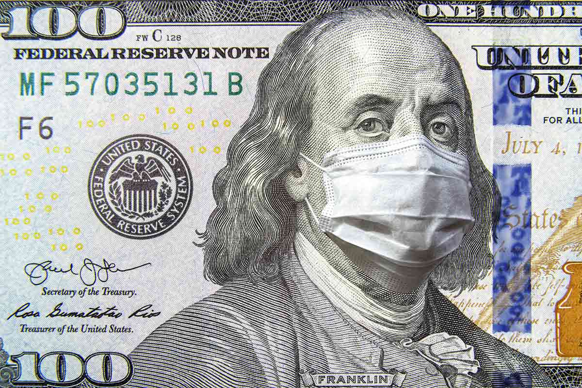 $100 bill with a mask over Benjamin Franklin's face