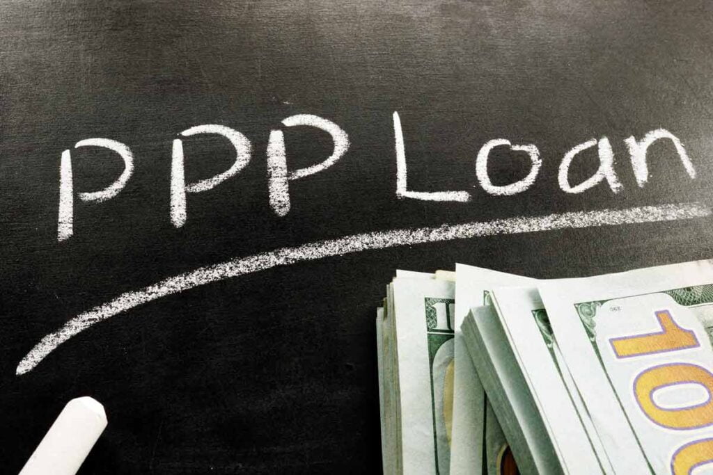 "ppp loan" written on a chalkboard