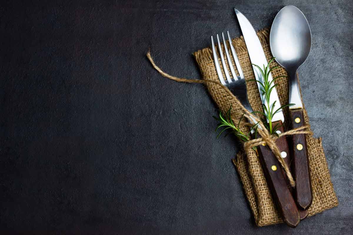 silverware set wrapped up with a napkin