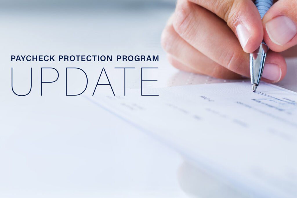 "Paycheck Protection Program UPDATE" printed next to a hand signing a check