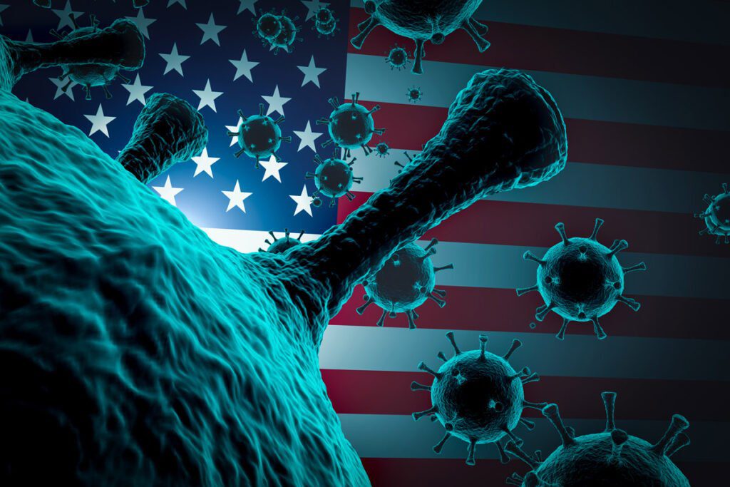 COVID-19 Viruses in front of an American Flag