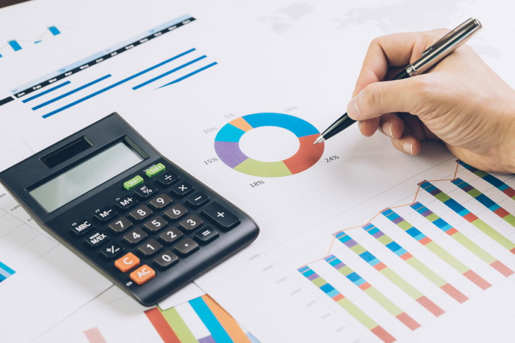 Person with business analytics printouts