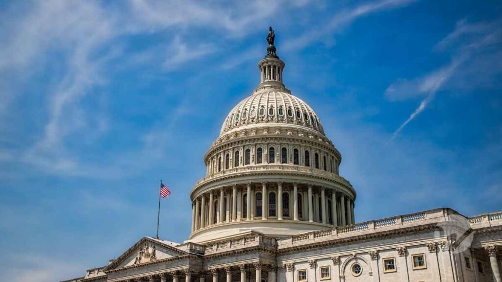 U.S. Capitol building under a blue sky, symbolizing the passage of federal legislation affecting individual taxpayers.